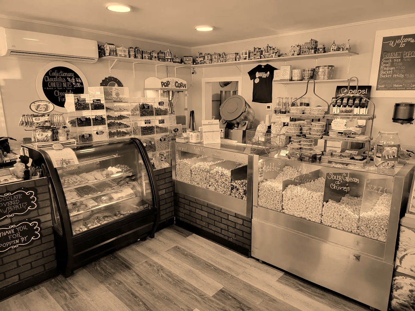 Inside Hopper's Poppers — gourmet popcorn cases, chocolates, and treats in Roxboro NC